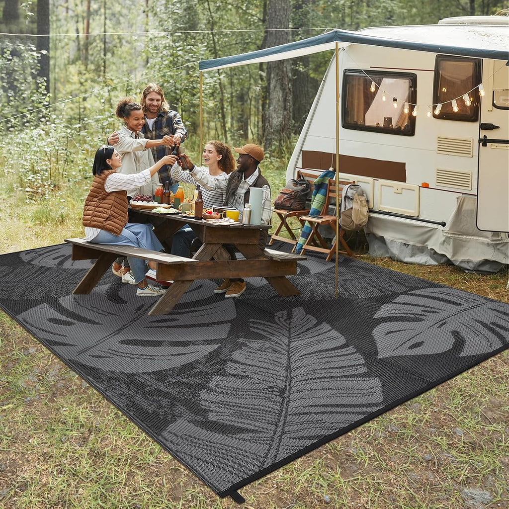 Outdoor Patio Rug 9X12 Waterproof Reversible Mat Leaf Tropical Outdoor Plastic Straw Rug with 4 Stakes and Starage Bag Portable Area Rug for Camping Porch Deck Rv Balcony Backyard Beach, Black